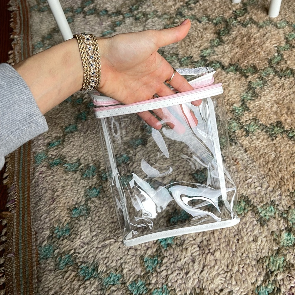 Clear pink/glitter travel bag. TSA approved